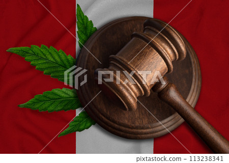 Marijuana law concept with a wooden gavel on the Peru flag background. 113238341