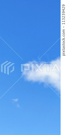 Beautiful view over the blue sky with white clouds Beautiful view over the blue sky with white clouds 113239429