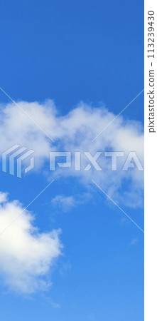 Beautiful view over the blue sky with white clouds 113239430