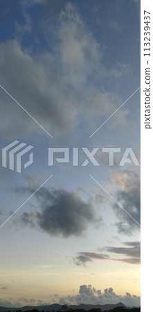 Beautiful twilight and clouds with golden yellow sunlight 113239437