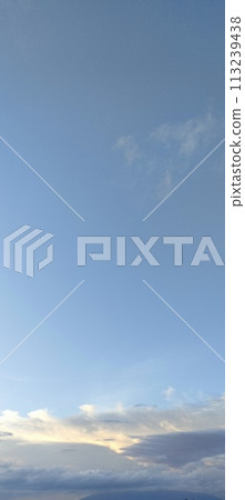 Beautiful view over the blue sky with white clouds 113239438