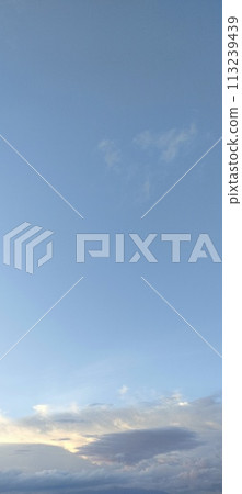 Beautiful view over the blue sky with white clouds 113239439