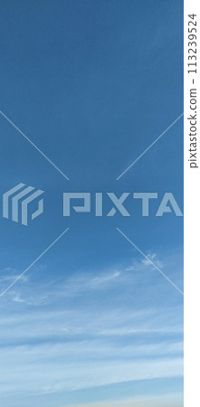 Beautiful view over the blue sky with white clouds Beautiful view over the blue sky with white clouds 113239524
