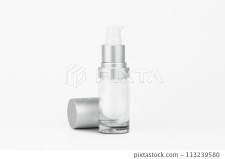 Mock-up an empty container a cream pump bottle with lid for cosmetic, isolated on white background with clipping path. 113239580