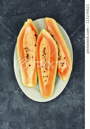 Papaya exotic fruits. 113239821