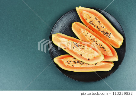 Fresh papaya, tropical fruits. 113239822