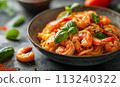 Delicious sauteed spicy shrimp with lime and basilik. 113240322