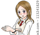 A high school girl shows her wrist (bracelet) with a serious expression 113241829