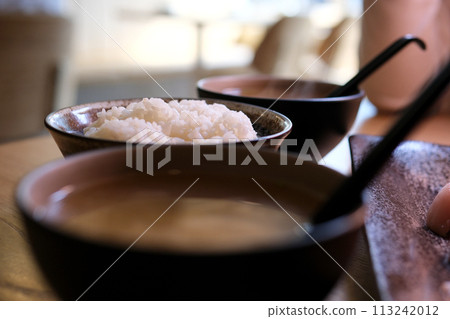 Miso soup is a traditional Japanese soup made primarily of miso paste, dashi broth, and additional ingredients such as vegetables, seaweed, and tofu Miso soup is a traditional Japanese soup made primarily of miso paste, dashi broth, and additional ingredients such as vegetables, seaweed, and tofu 113242012