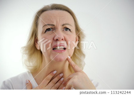 cold psychosomatics unwillingness to speak sore throat lump in throat unpleasant emotions negative facial expression raise eyes up tighten face open mouth slightly touch neck 113242244