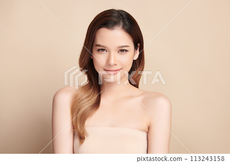 Beautiful young asian woman with clean fresh skin on beige background, Face care, Facial treatment, Cosmetology, beauty and spa, Asian women portrait. 113243158