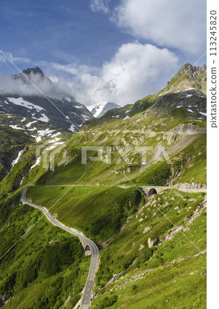 Landscape near Sustenpass with high alpine road, Innertkirchen - Gadmen, Switzerland Landscape near Sustenpass with high alpine road, Innertkirchen - Gadmen, Switzerland 113245820