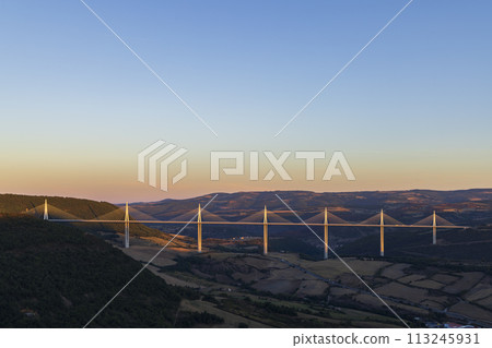 Multi-span cable stayed Millau Viaduct across gorge valley of Tarn River, Aveyron Departement, France Multi-span cable stayed Millau Viaduct across gorge valley of Tarn River, Aveyron Departement, France 113245931