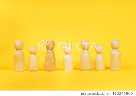 Family people figures on yellow background. Concept of family, values, unity, togetherness Family people figures on yellow background. Concept of family, values, unity, togetherness 113245960