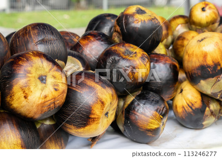 A group of sea coconut on the table for sale A group of sea coconut on the table for sale 113246277