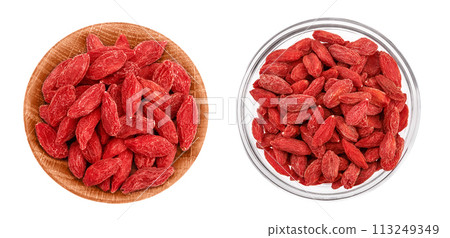 Dried goji berries in wooden bowl isolated on white background. Top view. Flat lay. Dried goji berries in wooden bowl isolated on white background. Top view. Flat lay. 113249349