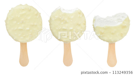 Bitten coconut Ice cream bar with white chocolate coating isolated on white background. Bitten coconut Ice cream bar with white chocolate coating isolated on white background. 113249356