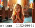 An adorable girl prays in church where Jesus gives rejoicing AI Generation 113249941