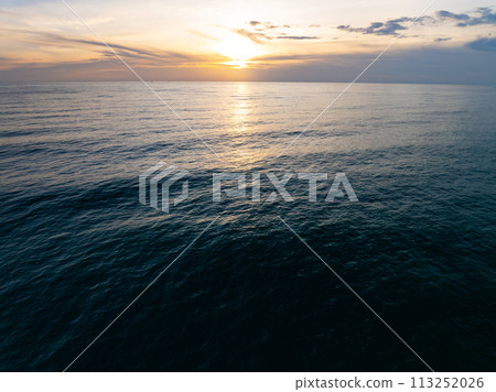 Landscape Sunset sky,Nature beautiful Light Sunset or sunrise over sea surface sky background 113252026