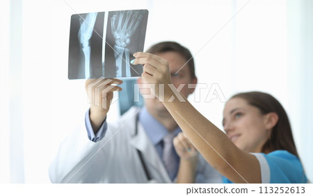 Doctor with colleague in hospital Doctor with colleague in hospital 113252613