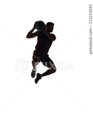 Silhouette of male basketball player in motion during game, training, playing isolated on white background. Full-length Silhouette of male basketball player in motion during game, training, playing isolated on white background. Full-length 113253045