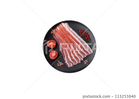 Fresh raw bacon sliced with spices and herbs Fresh raw bacon sliced with spices and herbs 113253840