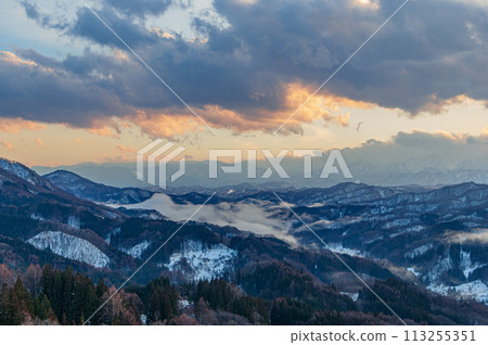 Snowy mountain at dusk 113255351