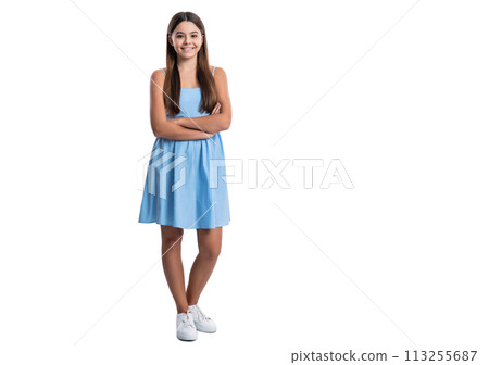 teen girl in summer dress at studio, copy space. teen girl in summer dress on background. 113255687