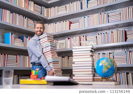 back to school. teachers day. education in school. knowledge day. Dive into a book. knowledge from book. man get university education. school education with man teacher. education and knowledge 113256149