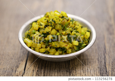 Mooli sabzi, stir-fried radish and radish leaves, Indian food Mooli sabzi, stir-fried radish and radish leaves, Indian food 113256278