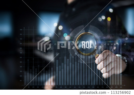 Investor analyzes return on investment on virtual screen. 113256902