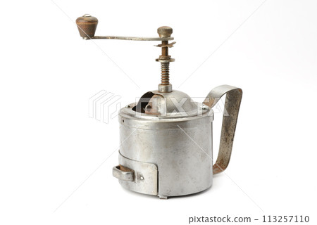 old manual coffee grinder isolated on white 113257110