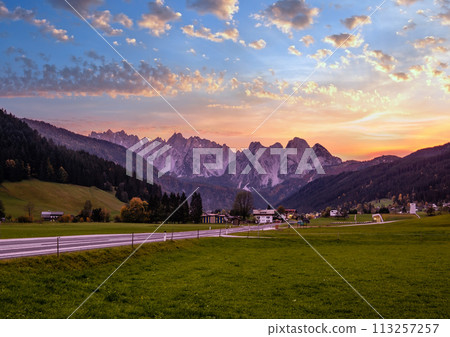 Sunset dusk Alps mountain countryside panoramic view (Austria, Gosau village outskirts) Sunset dusk Alps mountain countryside panoramic view (Austria, Gosau village outskirts) 113257257