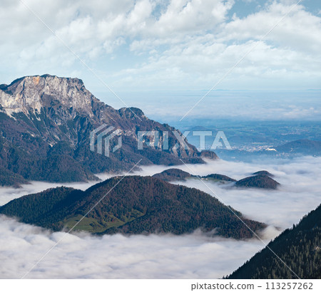 Autumn Alps mountain misty morning view from Jenner Viewing Platform, Schonau am Konigssee, Berchtesgaden national park, Bavaria, Germany. Autumn Alps mountain misty morning view from Jenner Viewing Platform, Schonau am Konigssee, Berchtesgaden national park, Bavaria, Germany. 113257262