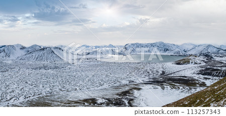 Colorful Landmannalaugar mountains under snow cover in autumn, southern Highlands of Iceland. Frostastadavatn lake at the foot of the mountains. 113257343