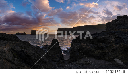 Picturesque autumn evening view Dyrholaey Cape, beach and  rock formations. Vik, South Iceland. 113257346