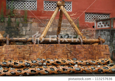China, Sichuan Province, Dujiangyan, bamboo basket and closed water tripod 113257636