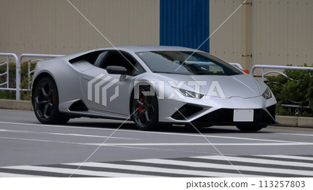 sports car running in the city 113257803