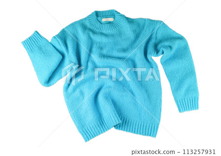 Turquoise flying crumpled women's autumn knitted sweater isolated on white background 113257931