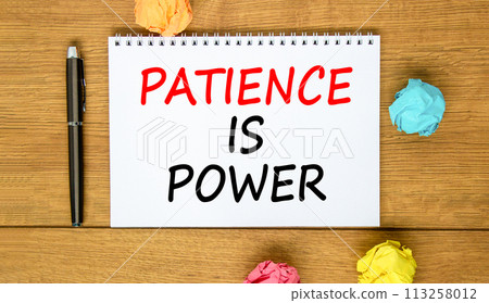 Patience is power symbol. Concept words Patience is power on beautiful white note. Beautiful wooden background. Black pen. Colored paper. Business and patience is power concept. Copy space. 113258012