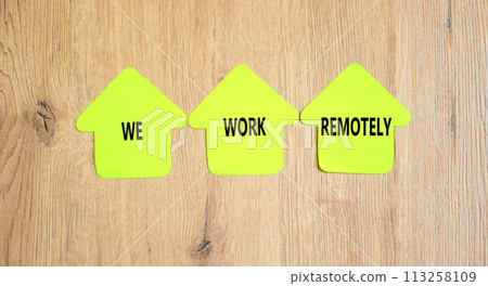 We work remotely symbol. Concept words We work remotely on beautiful yellow paper house. Beautiful wooden background. Business we work remotely concept. Copy space. We work remotely symbol. Concept words We work remotely on beautiful yellow paper house. Beautiful wooden background. Business we work remotely concept. Copy space. 113258109