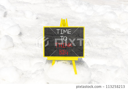 Time to think big symbol. Concept words Time to think big on beautiful black chalk blackboard. Beautiful white snow background. Business and time to think big concept. Copy space. Time to think big symbol. Concept words Time to think big on beautiful black chalk blackboard. Beautiful white snow background. Business and time to think big concept. Copy space. 113258213