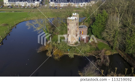 Schonauwen Castle, locally known as Kasteel Schonauwen in the province of Utrecht in the Netherlands. Beautiful view from above. Beautiful Dutch canals are filled with water. Schonauwen Castle, locally known as Kasteel Schonauwen in the province of Utrecht in the Netherlands. Beautiful view from above. Beautiful Dutch canals are filled with water. 113259092