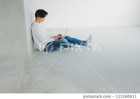 A man wearing a T-shirt A man wearing a T-shirt 113260911