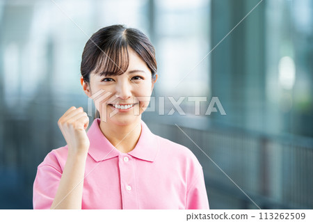 A young female caregiver. A young female caregiver. 113262509