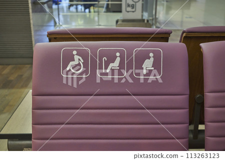 Disabled Handicap sign on a chair reserved for people with disabilities, elderly or pregnant women Disabled Handicap sign on a chair reserved for people with disabilities, elderly or pregnant women 113263123