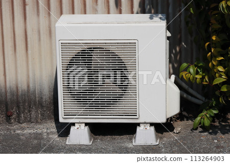 Scenery with an old air conditioner outdoor unit Scenery with an old air conditioner outdoor unit 113264903