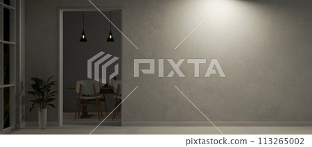 The interior design of a modern loft home corridor at night with a doorway through a dining room. The interior design of a modern loft home corridor at night with a doorway through a dining room. 113265002