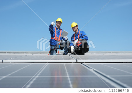 Team of engineers working at the factory 113266746