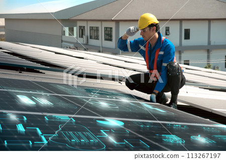 Engineers install solar cells on the roof of factory Engineers install solar cells on the roof of factory 113267197